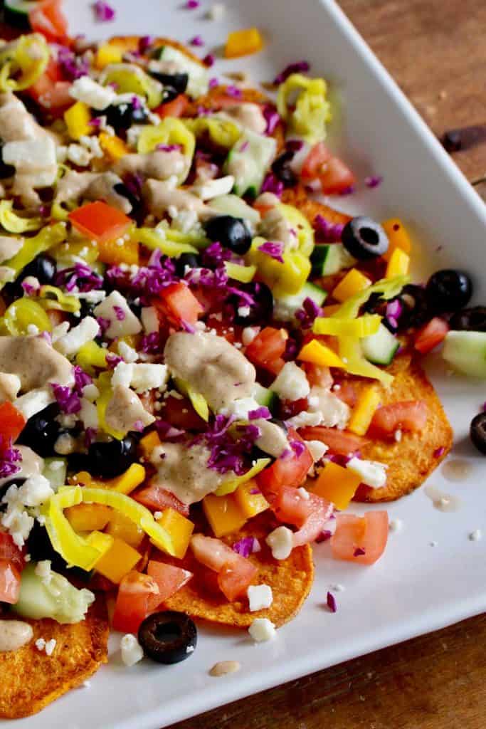 Sweet potato nachos on white platter.