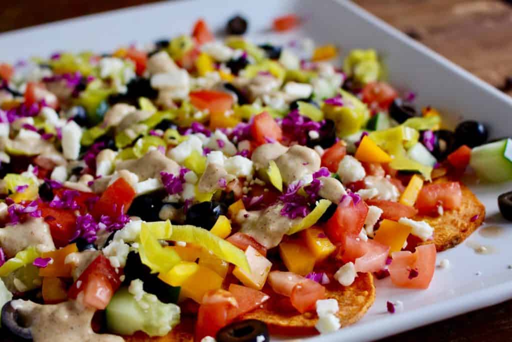 Sweet potato nachos on white platter.